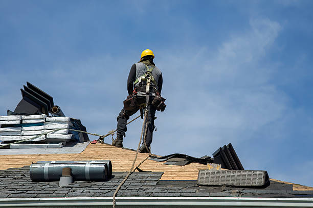 Professional Gutter Installation technician working in Prescott, KS